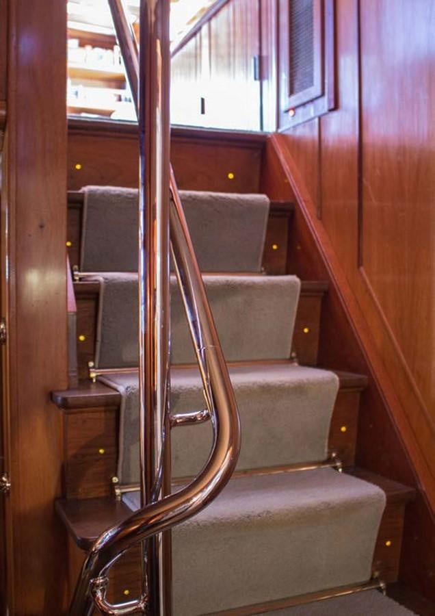a chair in a room aboard FEI-SEEN Yacht for Sale