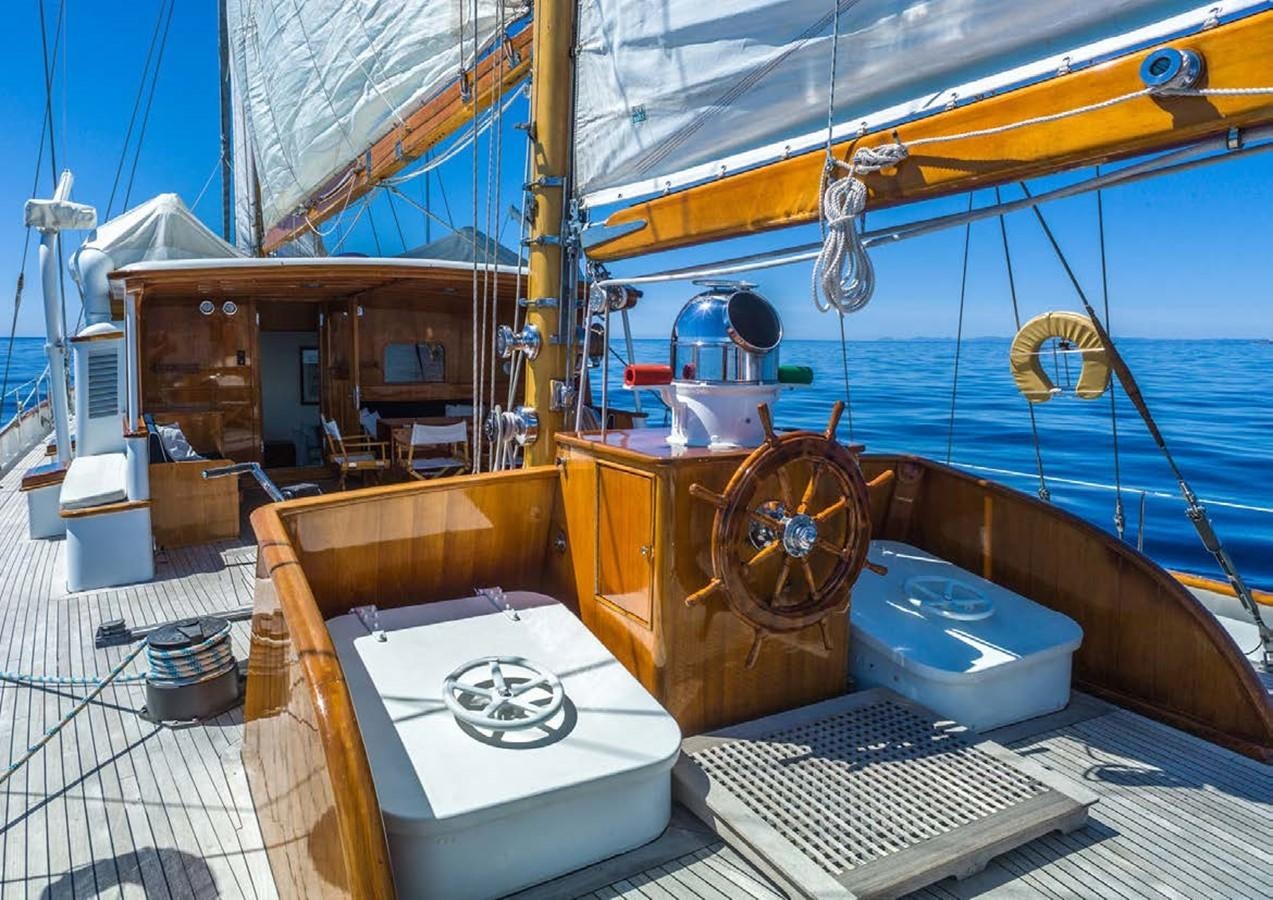 a boat with a large round wheel aboard FEI-SEEN Yacht for Sale