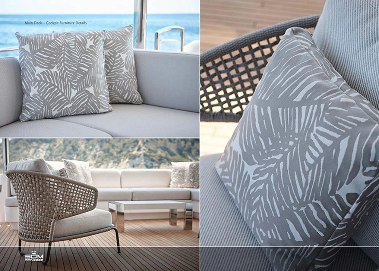 a couple of pillows on a couch aboard PRINCESS 30M Yacht for Sale