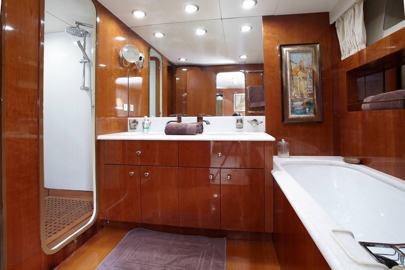 a bathroom with a large mirror aboard QUEEN SOUTH Yacht for Charter