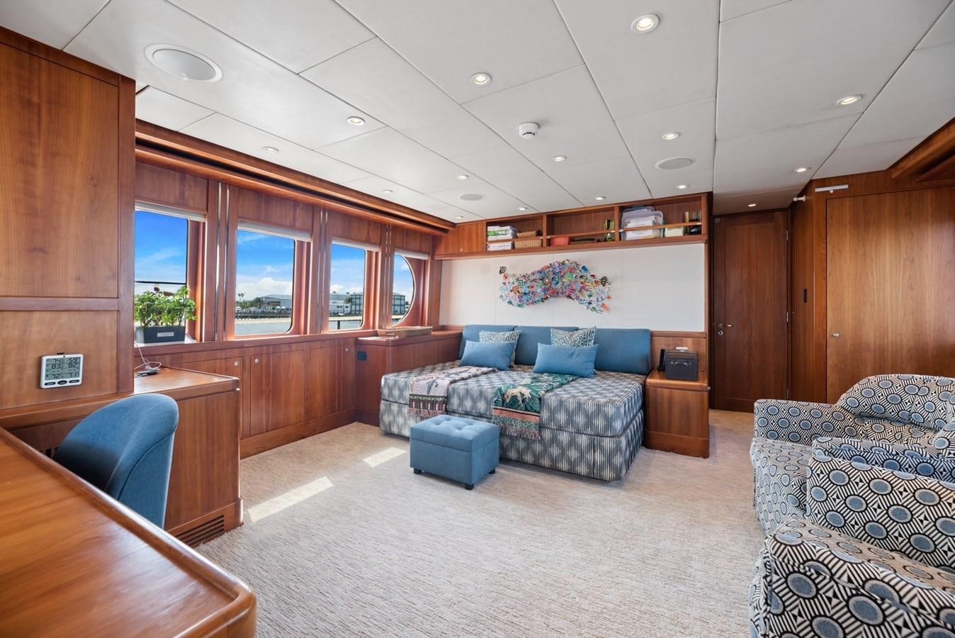 a room with a couch and a table aboard A.B. NORMAL Yacht for Sale