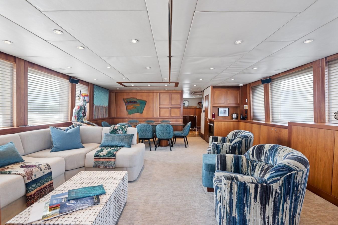 a living room with a couch and chairs aboard A.B. NORMAL Yacht for Sale