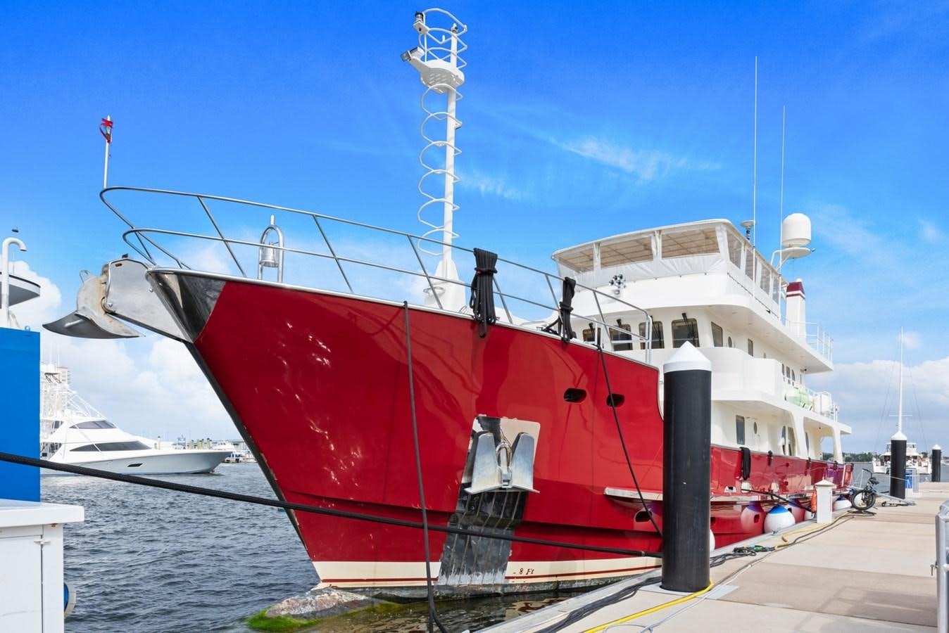 a large red and white ship aboard A.B. NORMAL Yacht for Sale