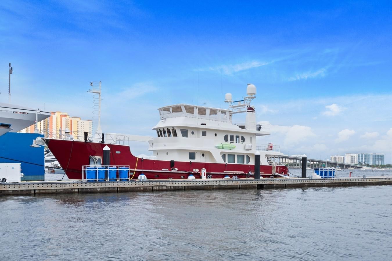 a large red and white ship aboard A.B. NORMAL Yacht for Sale