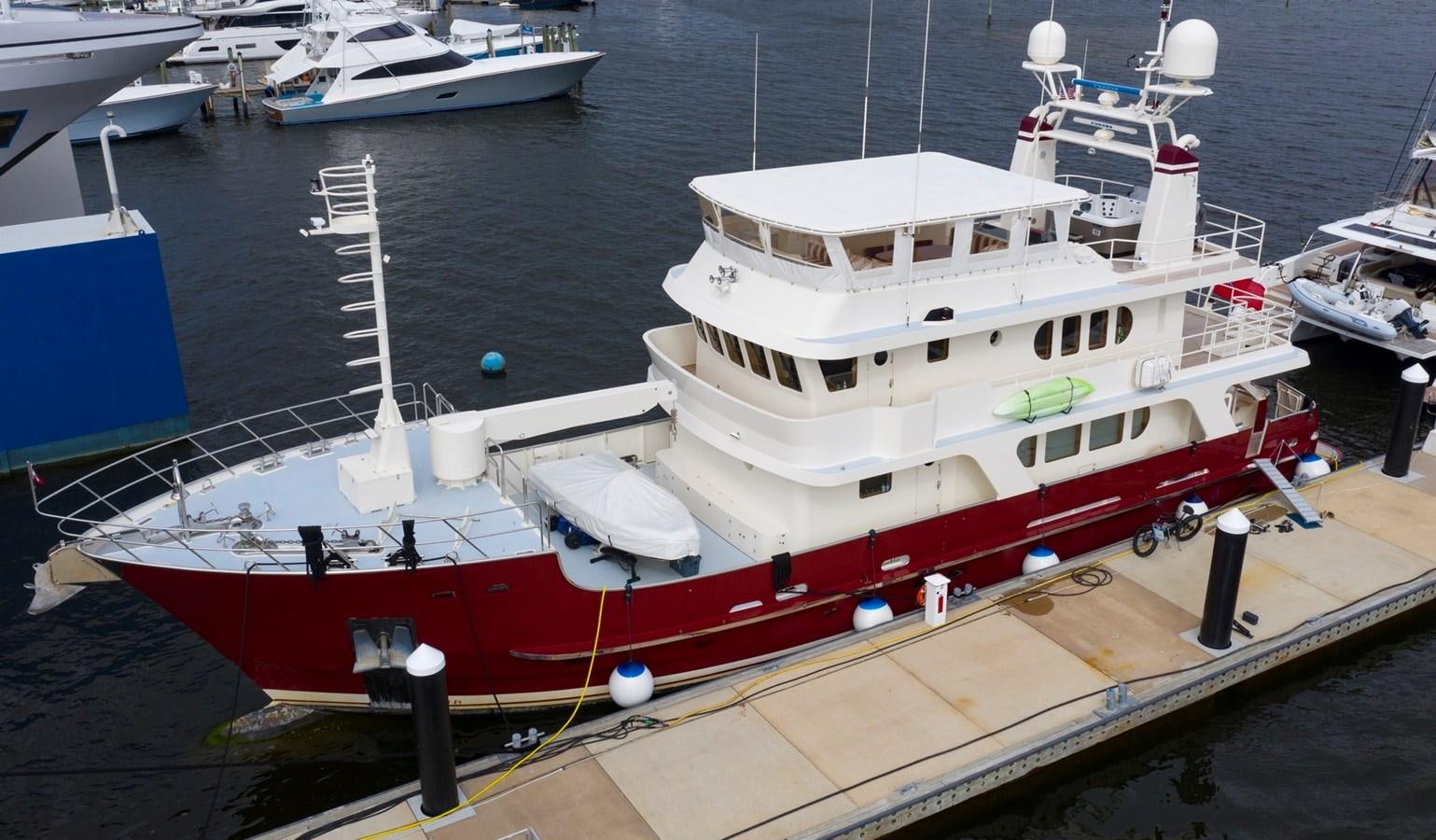 a boat docked at a pier aboard A.B. NORMAL Yacht for Sale