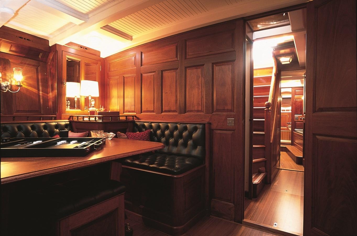 a kitchen with wooden cabinets aboard MOONBEAM OF FIFE III Yacht for Sale