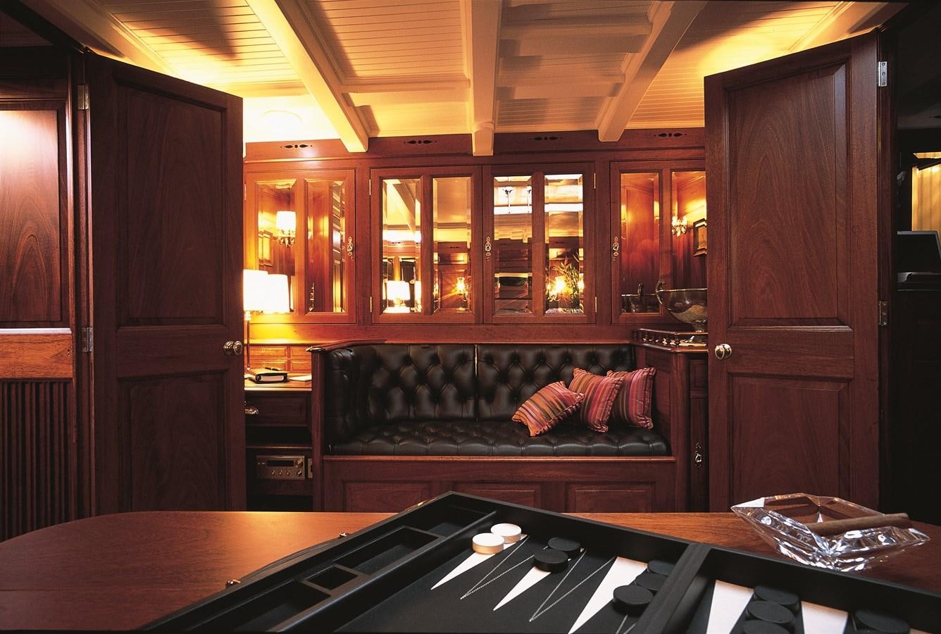 a kitchen with a bar and a bar aboard MOONBEAM OF FIFE III Yacht for Sale