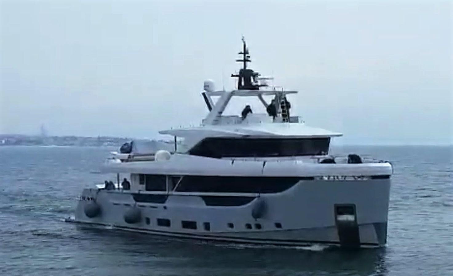 a white boat on the water aboard XPLO BV-30 Yacht for Sale