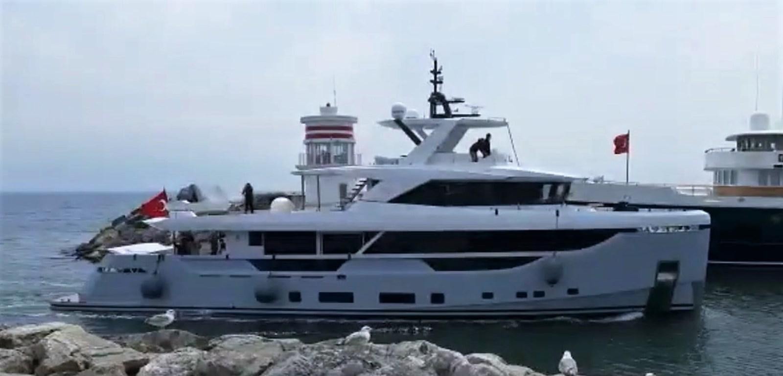 a large white ship in the water aboard XPLO BV-30 Yacht for Sale