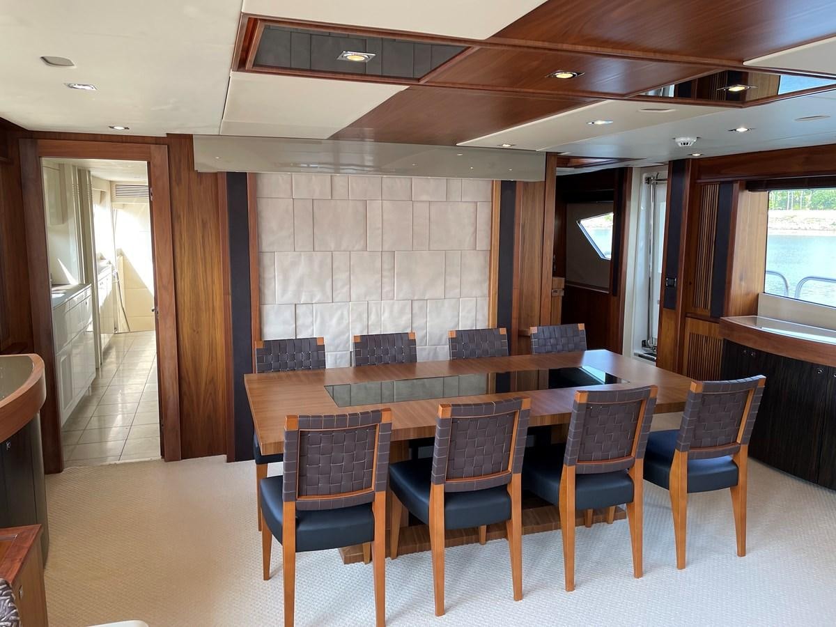 a large dining table in a room aboard SUNSEEKER 30M Yacht for Sale