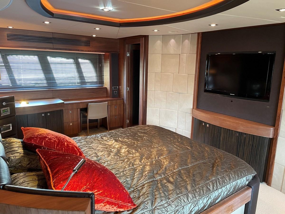 a bed in a room aboard SUNSEEKER 30M Yacht for Sale