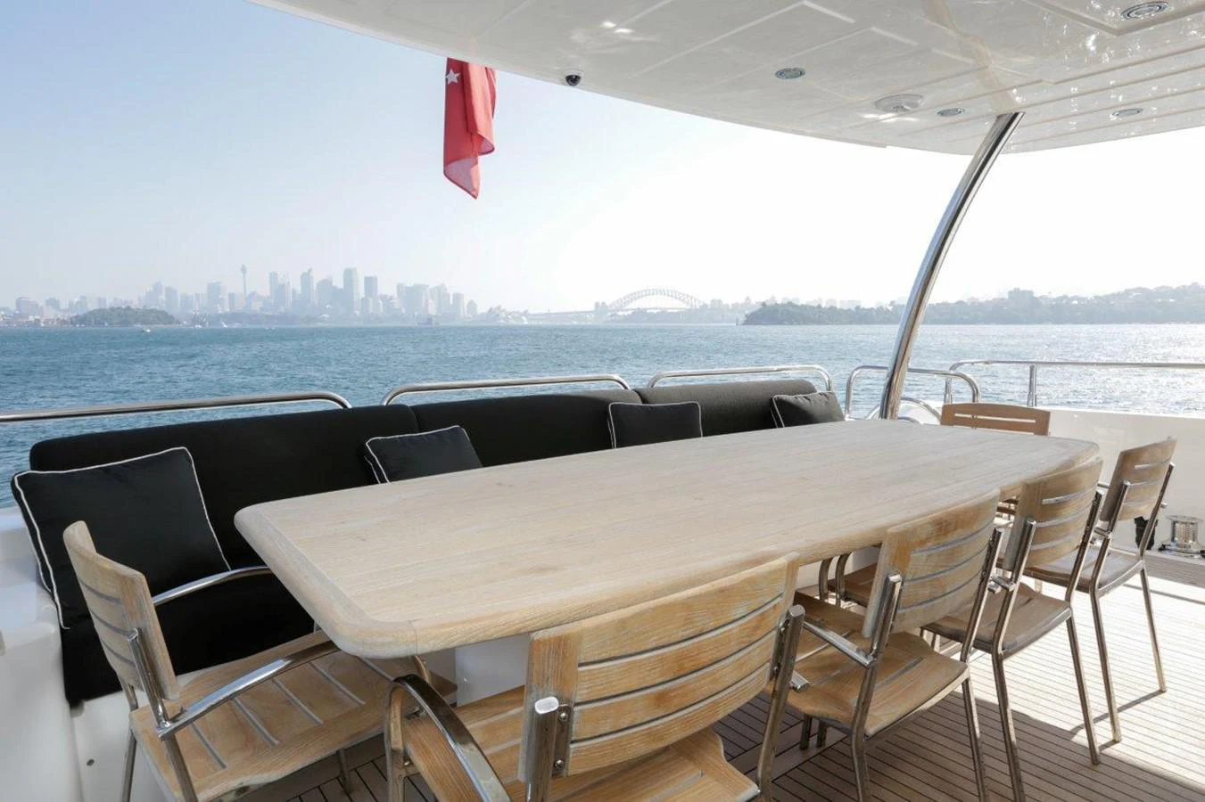 a table with chairs on it aboard COLETTE Yacht for Sale