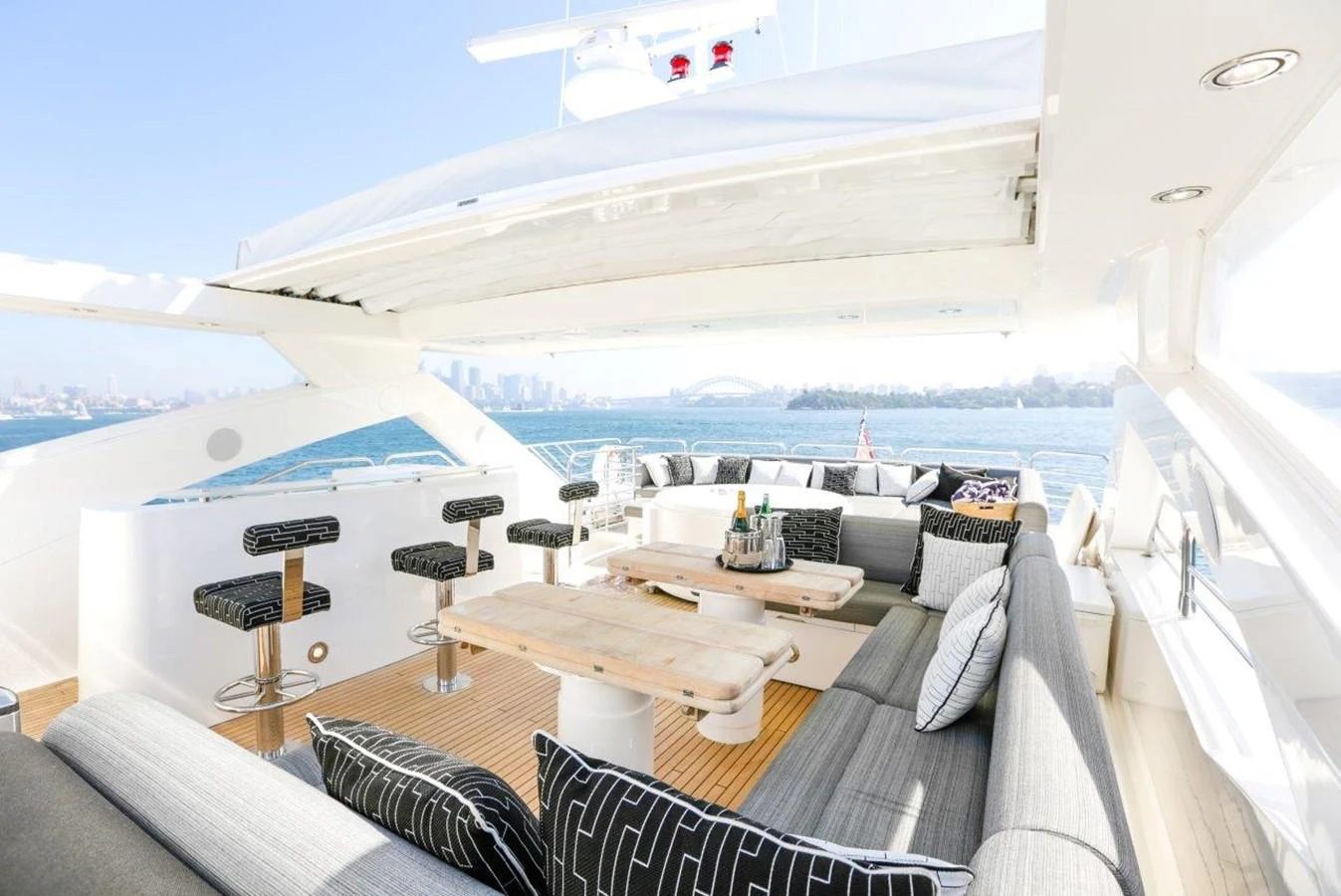 a room with a table and chairs aboard COLETTE Yacht for Sale