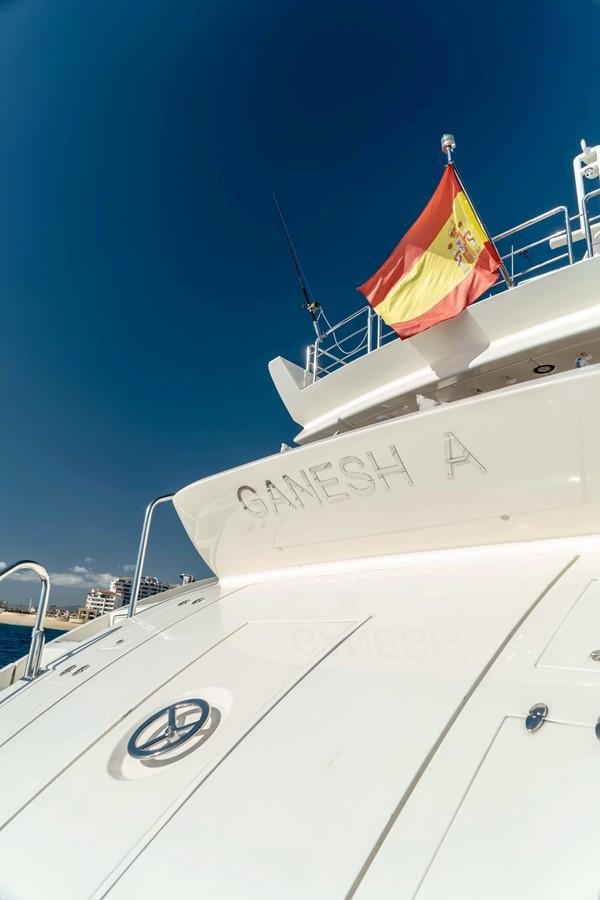 a flag on a plane aboard GANESH A Yacht for Sale