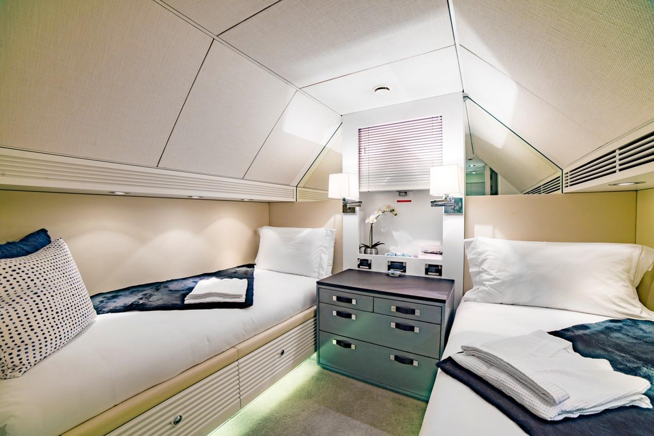 a room with two beds aboard BARGE SAVVY Yacht for Sale