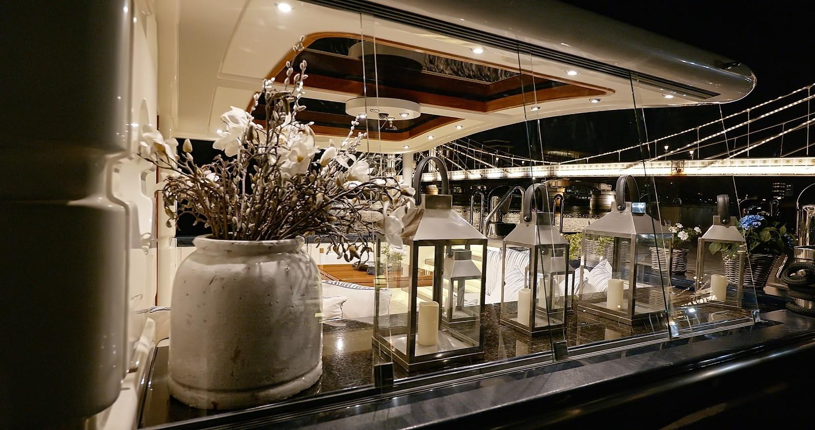 a vase with flowers in it aboard BARGE SAVVY Yacht for Sale