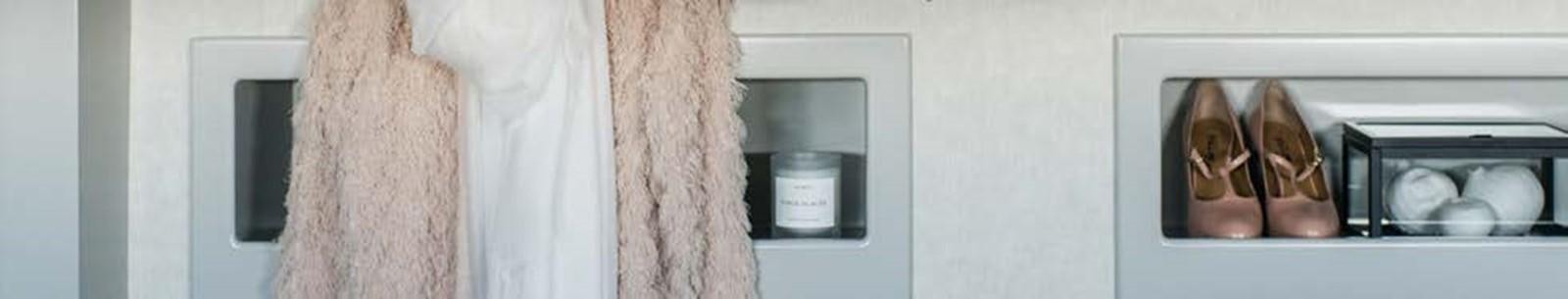 a close-up of a person's leg and a pair of shoes aboard JAMADHAR Yacht for Sale