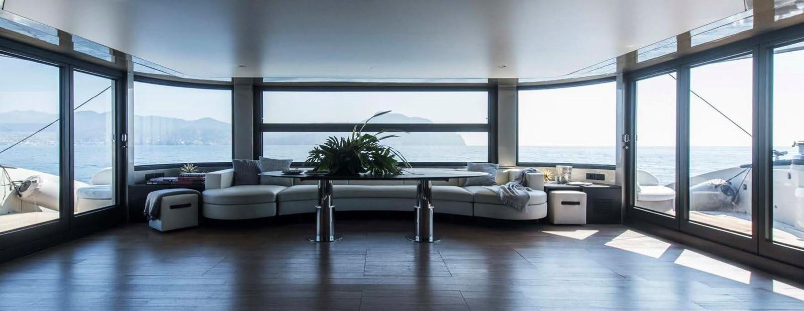 a room with a bed and a desk aboard JAMADHAR Yacht for Sale