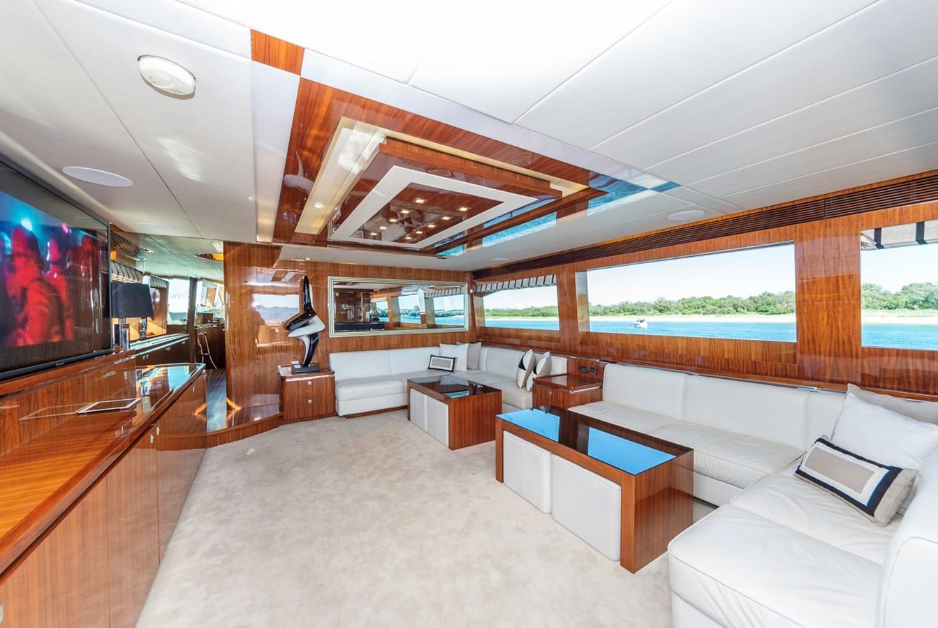 a room with a large television and a couch aboard SUMMER WIND Yacht for Sale