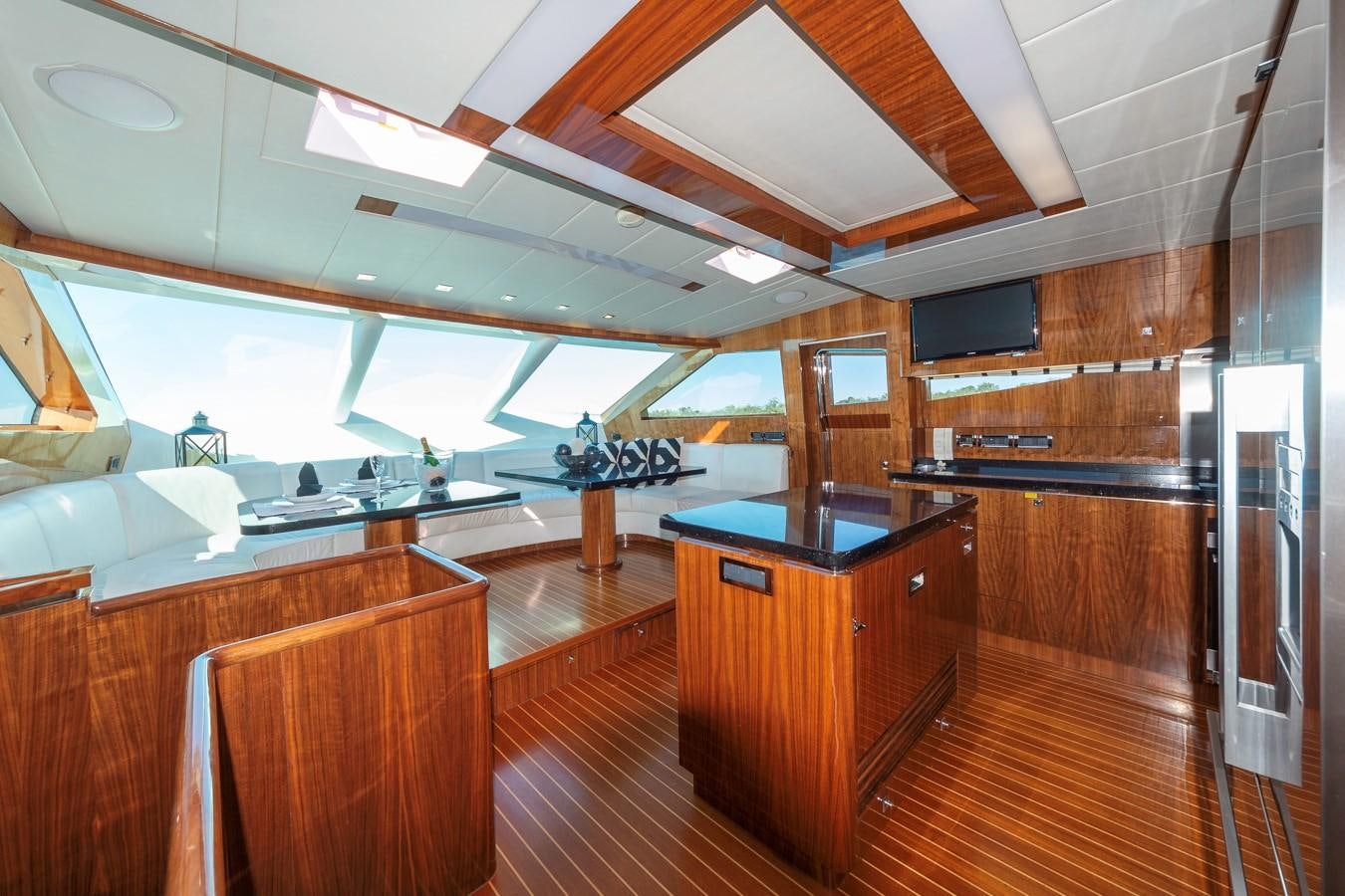 a large kitchen with wooden cabinets aboard SUMMER WIND Yacht for Sale