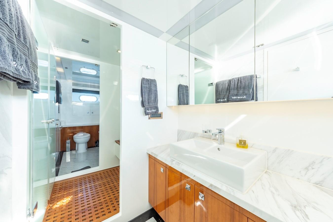 a bathroom with a sink and a mirror aboard SUMMER WIND Yacht for Sale