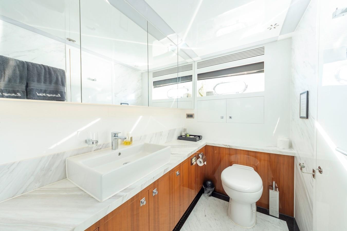 a bathroom with a sink and a toilet aboard SUMMER WIND Yacht for Sale