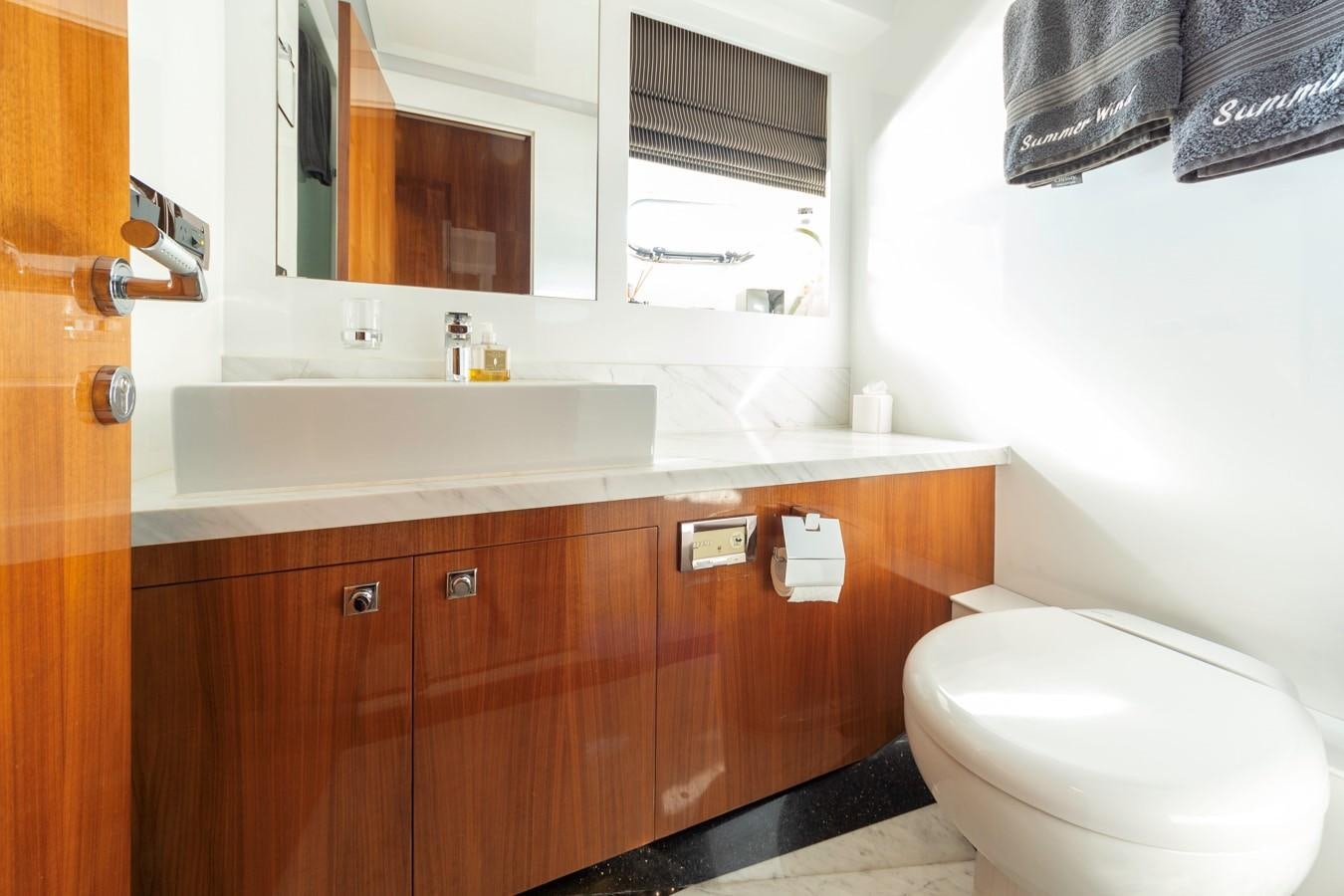 a bathroom with a sink and a toilet aboard SUMMER WIND Yacht for Sale