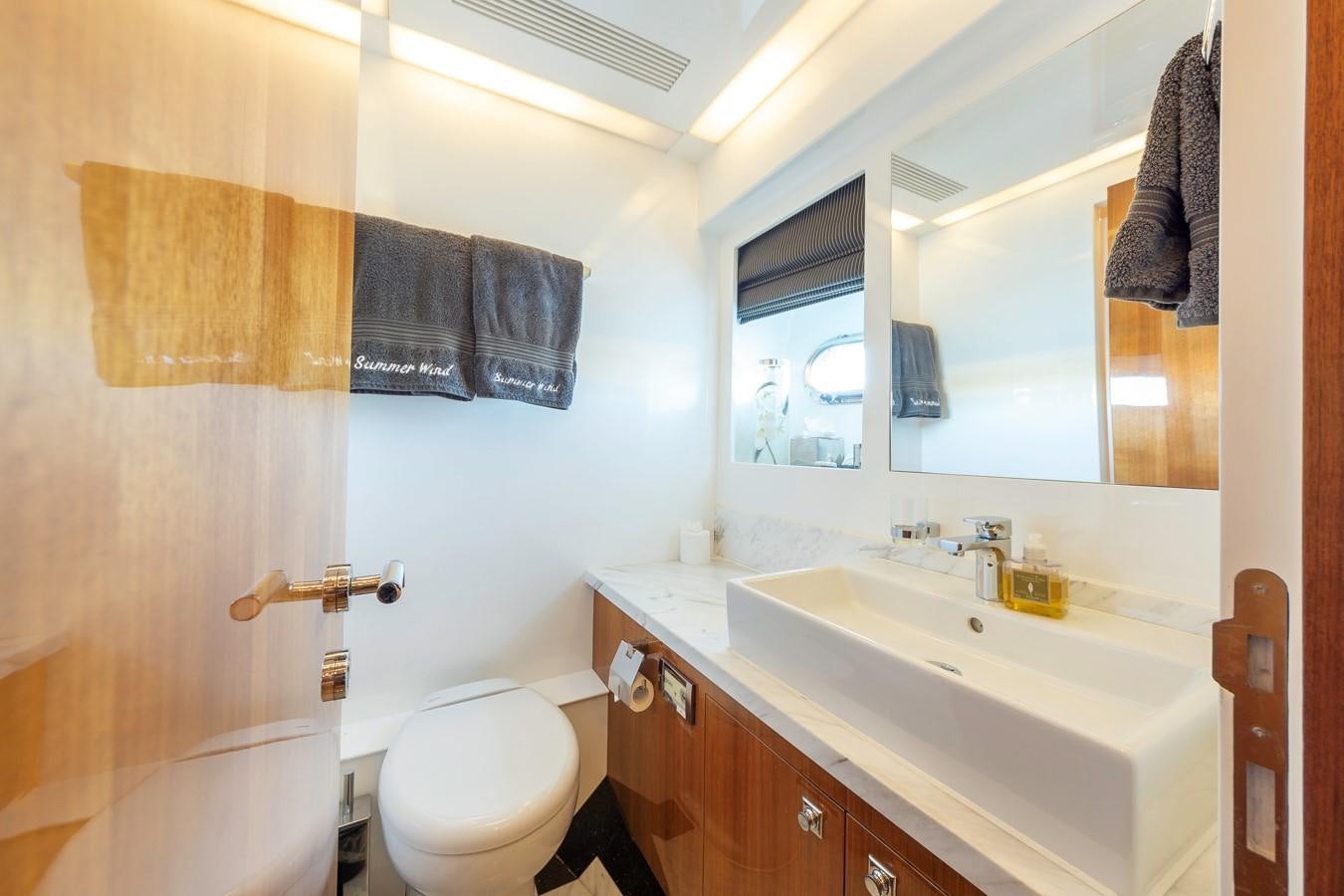 a bathroom with a sink and a toilet aboard SUMMER WIND Yacht for Sale