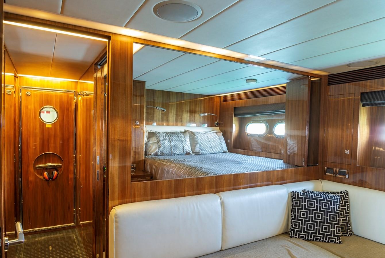 a room with a bed and a couch aboard SUMMER WIND Yacht for Sale