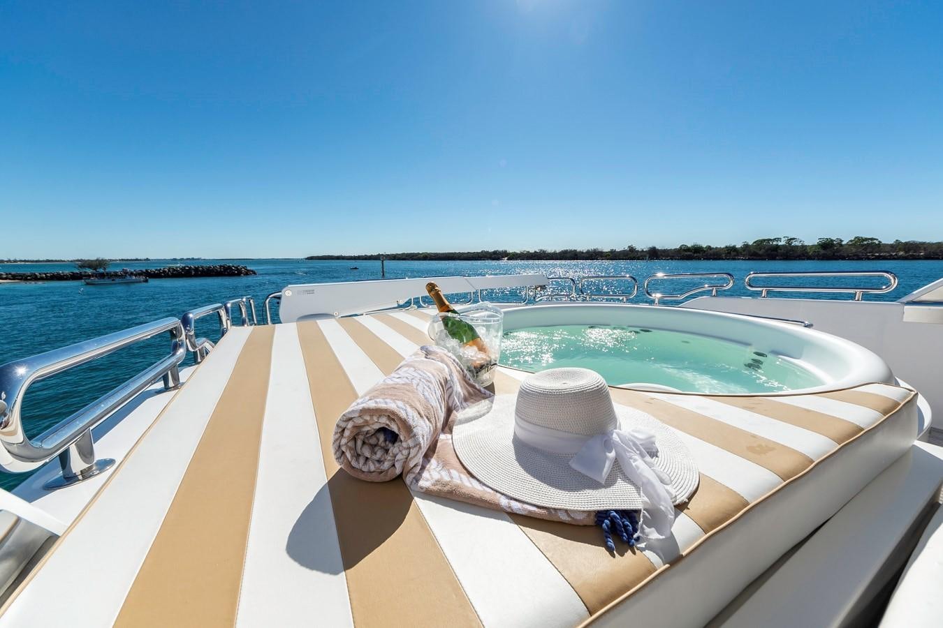 a person sitting on a boat aboard SUMMER WIND Yacht for Sale