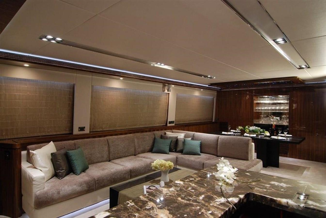 a living room with a couch and a table aboard RP100 (NEW BOAT SPEC)  Yacht for Sale