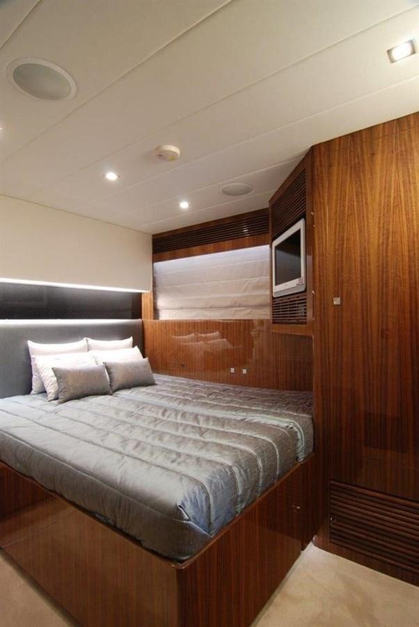 a bed in a room aboard RP100 (NEW BOAT SPEC)  Yacht for Sale