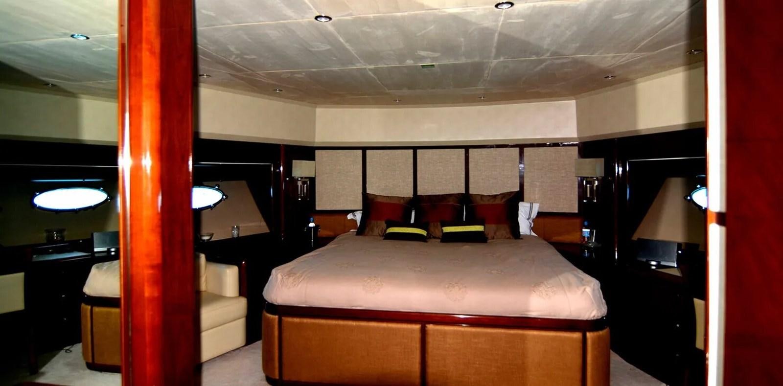 a bed in a room aboard PRINCESS 95 Yacht for Sale