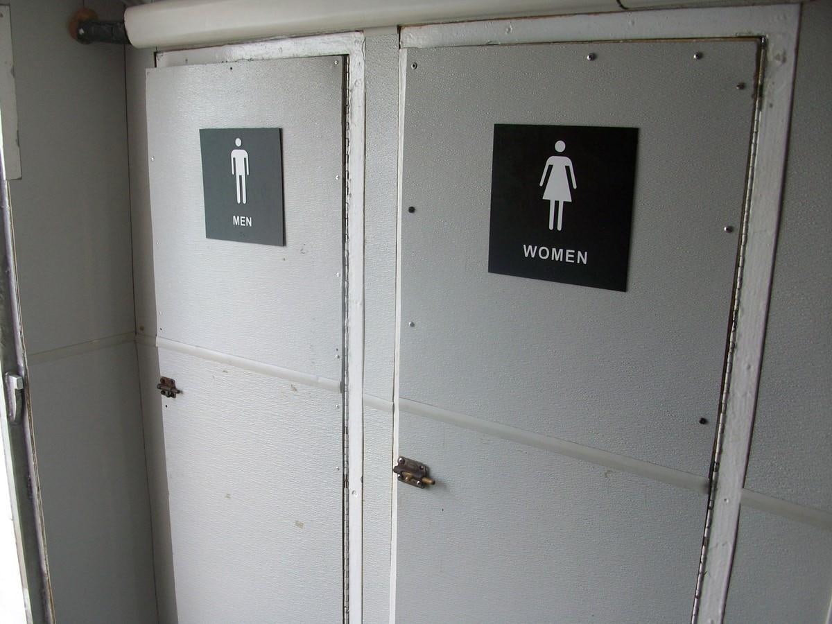 a white door with a black sign on it aboard NO NAME HALF MOON CLIPPER Yacht for Sale