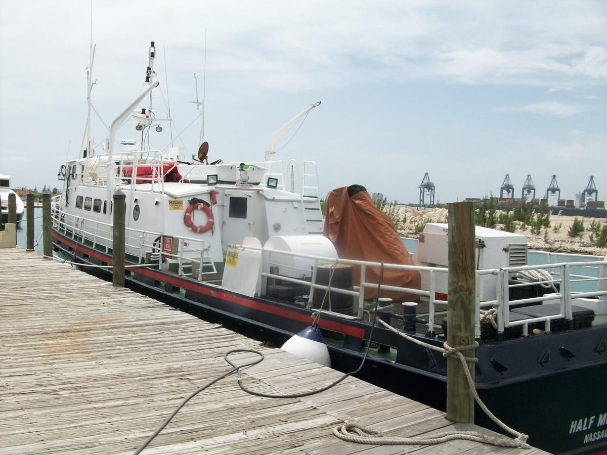 a dog on a boat aboard NO NAME HALF MOON CLIPPER Yacht for Sale