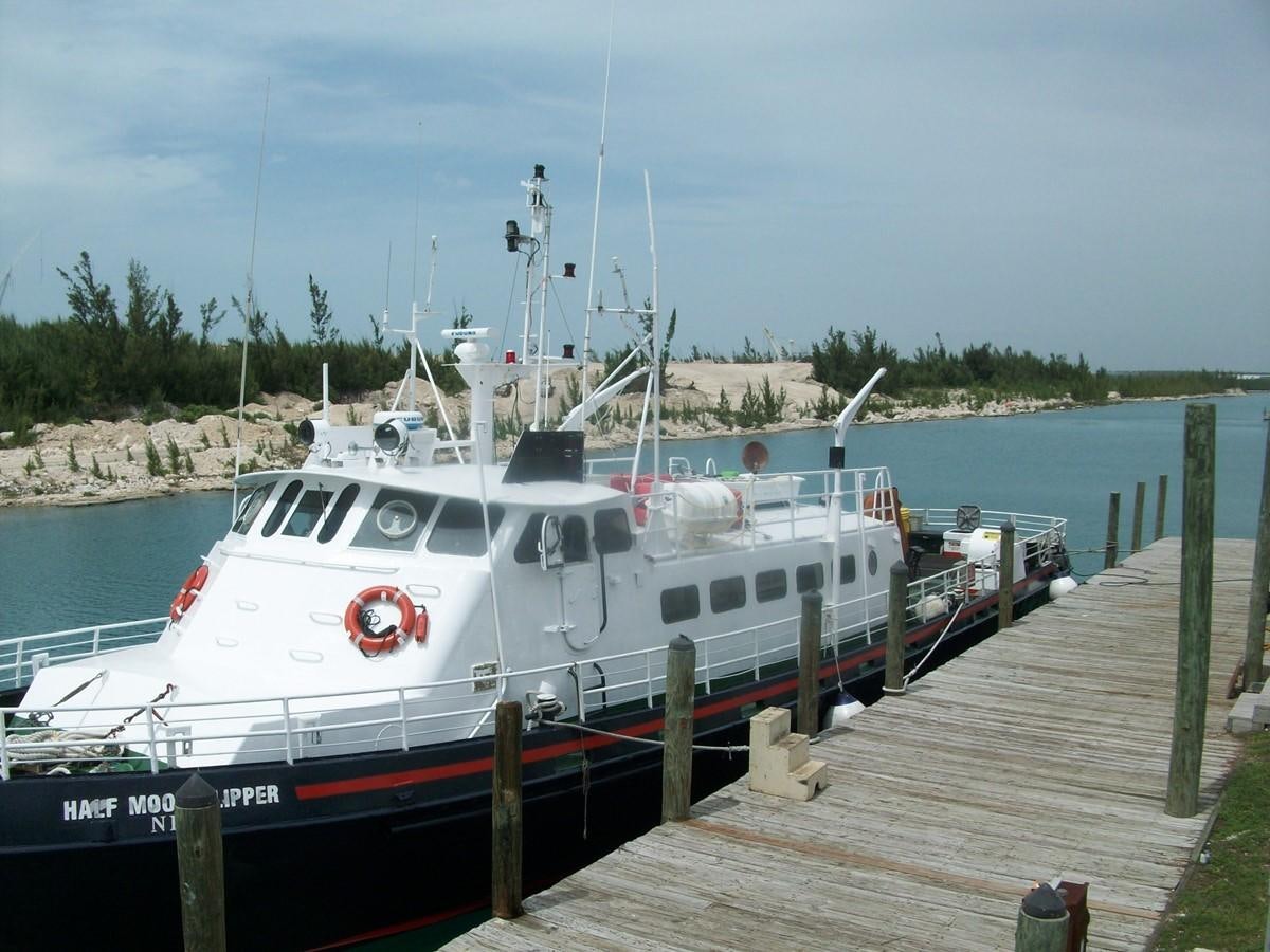 a boat docked at a pier aboard NO NAME HALF MOON CLIPPER Yacht for Sale