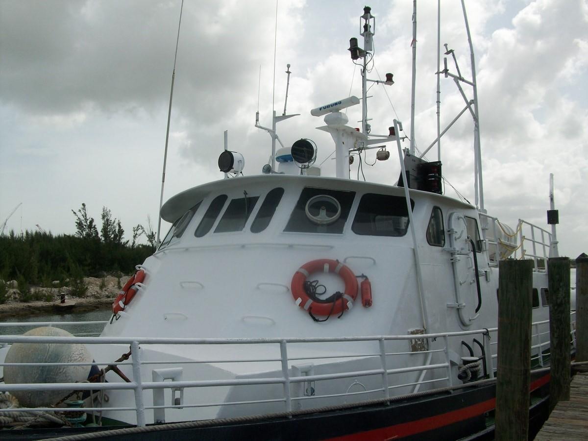 a white boat docked aboard NO NAME HALF MOON CLIPPER Yacht for Sale