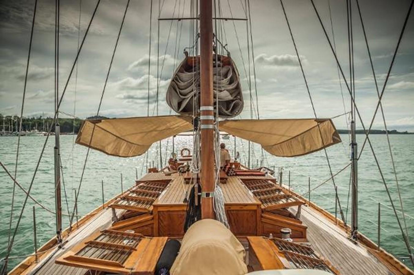 a sailboat on the water aboard 95FT 2011 CUSTOM KETCH CLASSIC YACHT Yacht for Sale