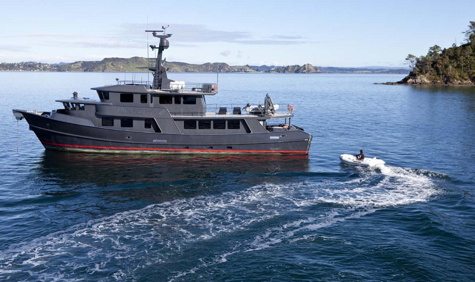 a boat on the water aboard PACIFIC HQ Yacht for Sale