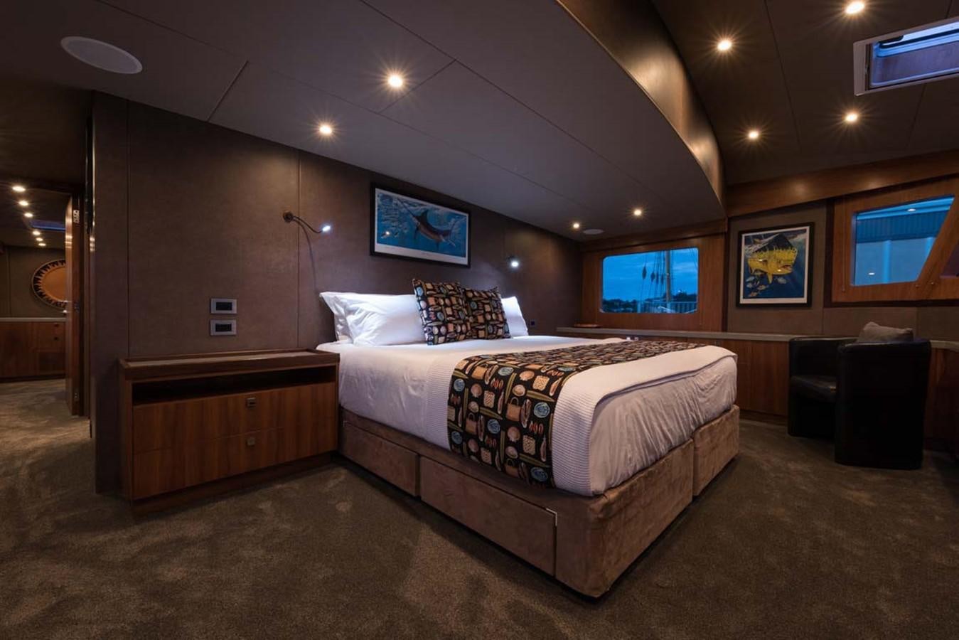 a large bed in a room aboard PACIFIC HQ Yacht for Sale