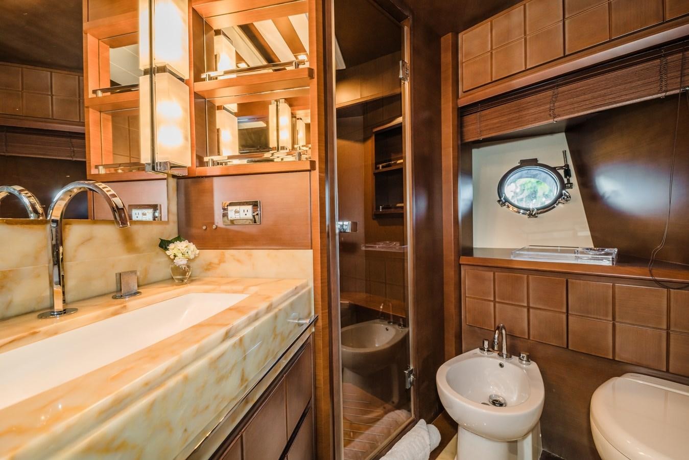 a bathroom with a sink and a mirror aboard SEA HACK Yacht for Sale