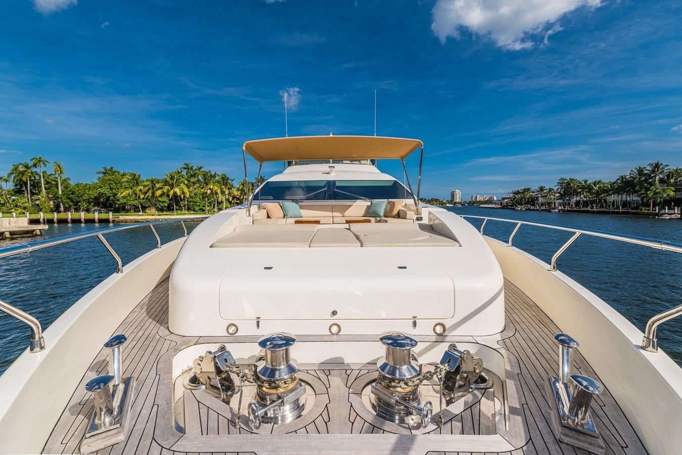 a white boat on a body of water aboard SEA HACK Yacht for Sale