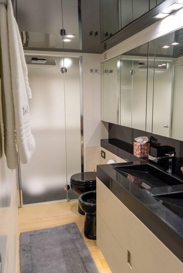 a bathroom with a shower unit and sink aboard VITA XL Yacht for Sale