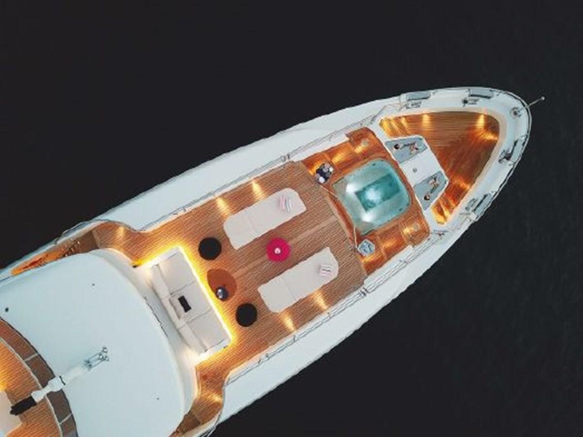 a close-up of a white guitar aboard 2020 BENETTI DELFINO 95 Yacht for Sale