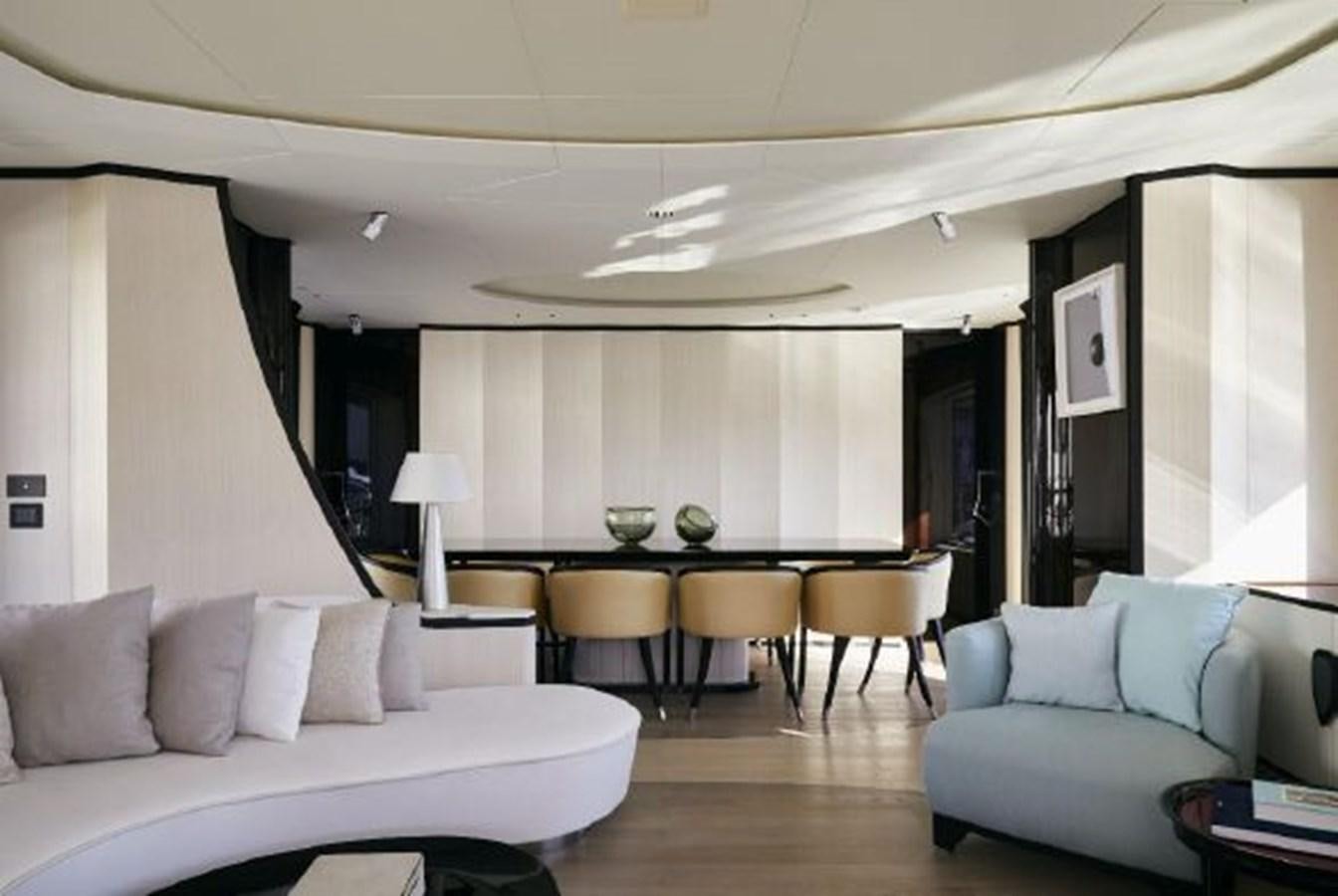 a living room with a couch and a table aboard 2020 BENETTI DELFINO 95 Yacht for Sale