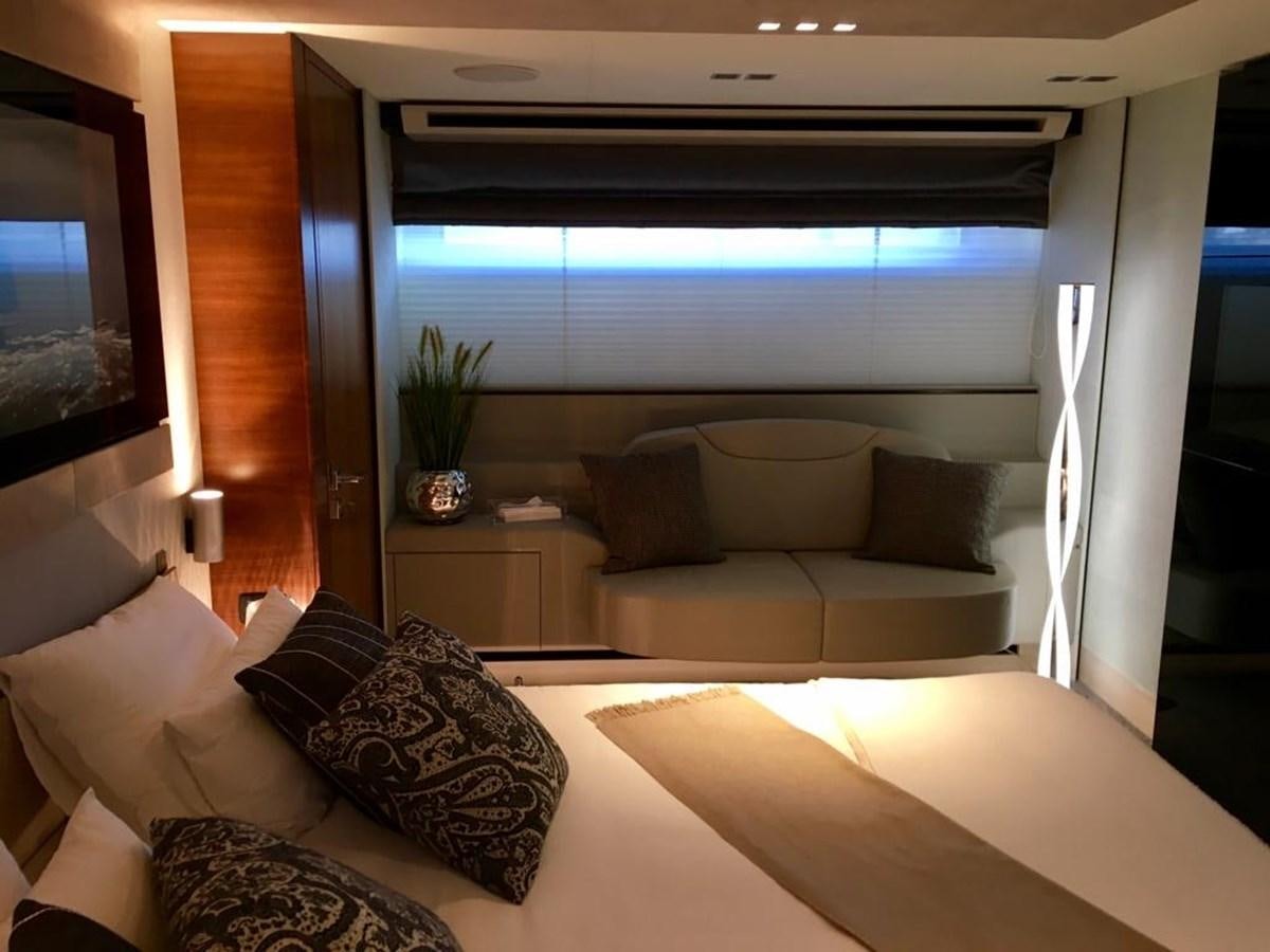 a living room with a large window aboard KEROS ISLAND Yacht for Sale