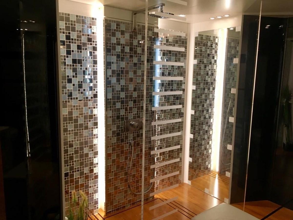 a room with glass walls aboard KEROS ISLAND Yacht for Sale