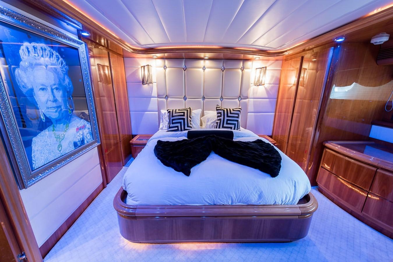 a bed in a room aboard 00Z Yacht for Sale