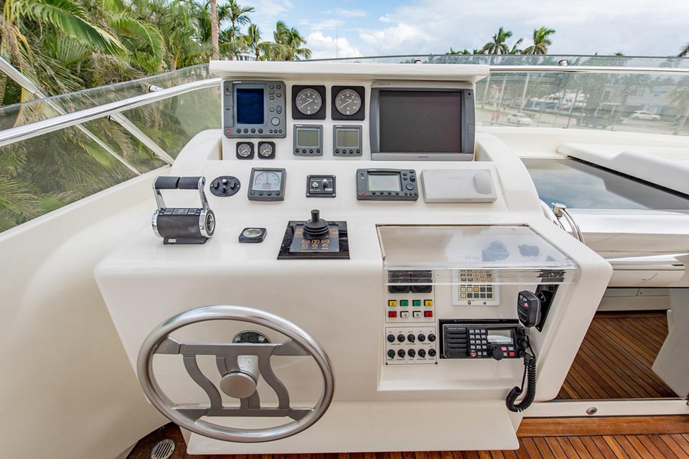 a white vehicle with a screen and a steering wheel aboard 00Z Yacht for Sale