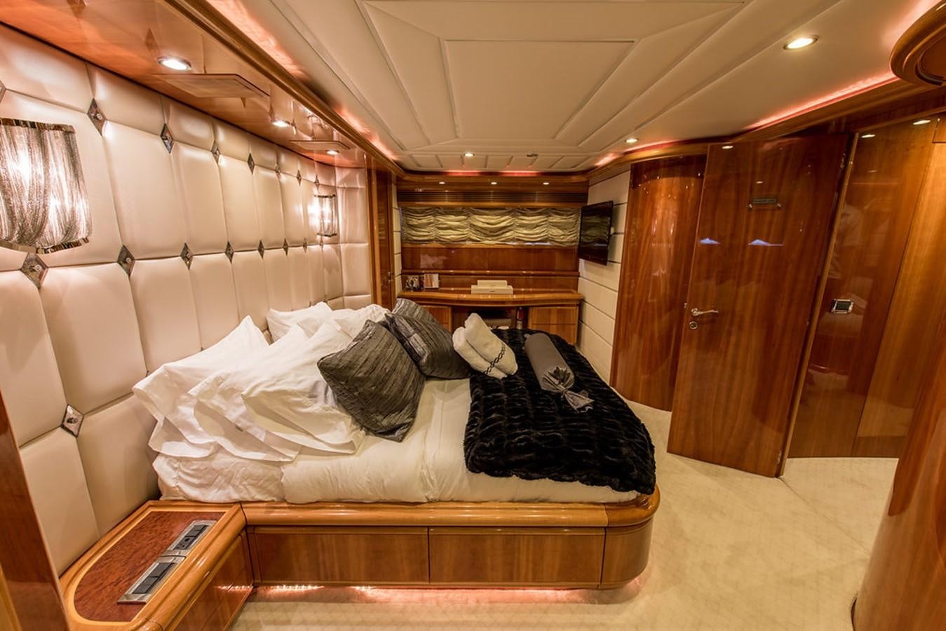 a bed in a room aboard 00Z Yacht for Sale